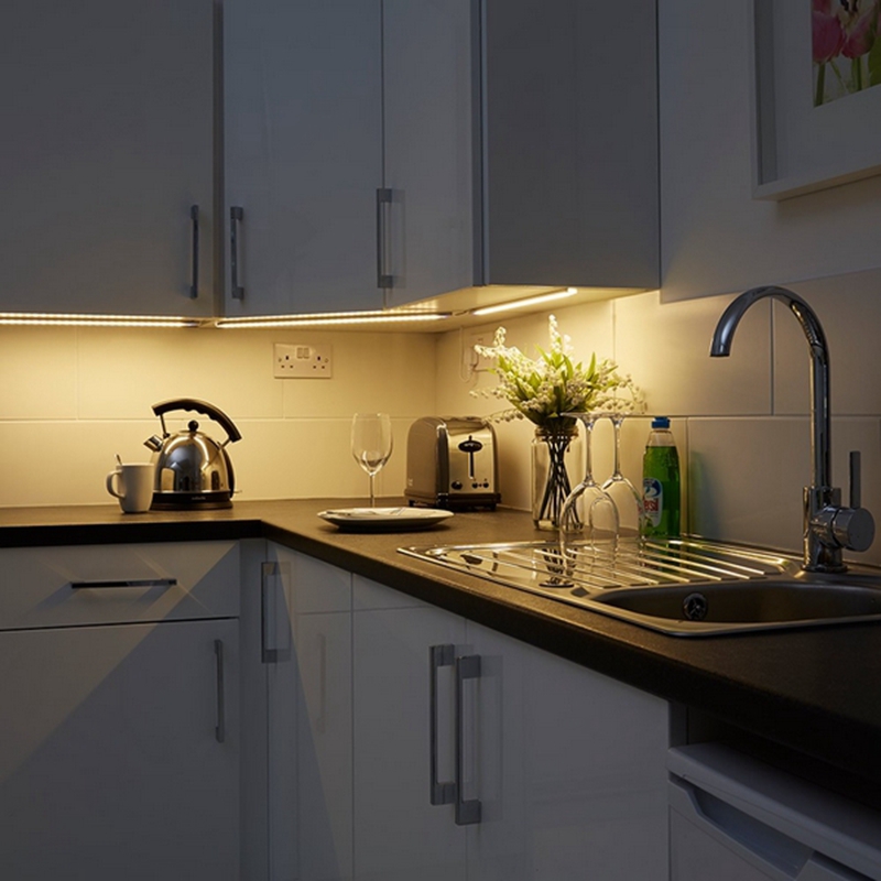 What are the functions of cabinet lighting?